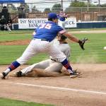 Dave Logan/for Peninsula Daily News Lefties first baseman C.J. Shauwecker, left, reaches for a throw from Port Angeles right fielder Nick DiPonzio to double up Yakima Valleys Noah Andrews and record the second out of a double play Tuesday night at Civic Field.