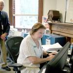 Jefferson County Election Coordinator Betty Johnson verifies signatures of a petition submitted by the Committee for Port Accountability on Tuesday morning at the county auditors office. David Neuenschwander of Quilcene, left, is a leader of the committee, which is seeking to ask the Port of Port Townsend to ask voters if they should approve a 20-year property tax levy. The verification process might last through Friday, Johnson said. (Brian McLean/Peninsula Daily News)