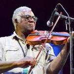 Earl White is among the elder statesmen at the 2019 Festival of American Fiddle Tunes, which has its finale concert at Fort Worden this Saturday. (Diane Urbani de la Paz/for Peninsula Daily News)