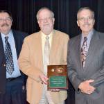 Pictured, from left to right, Undersheriff Ron Cameron, 2018 Volunteer of the Year Dale Jackson and Sheriff Bill Benedict.