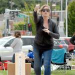 Shannon Cosgrove of Port Angeles tosses a bean bag during Thursdays Independence Day cornhole tournament at Pebble Beach Park in Port Angeles. (Keith Thorpe/Peninsula Daily News)