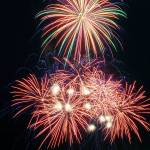 Bursts of fireworks light up the sky over Port Angeles Harbor during Thursdays annual Independence Day display. (Keith Thorpe/Peninsula Daily News)