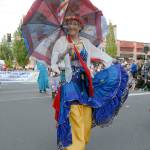 Maria White marches with members of the Port Angeles Senior Center on Thursday. (Keith Thorpe/Peninsula Daily News)