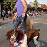 Ella Garcelon, 11, a member of the Silver Spurs 4-H Club, marches down First Street with her dog, Sherman, on Thursday evening. (Keith Thorpe/Peninsula Daily News)