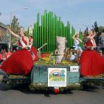 The Sequim Irrigation Festival float carrying festival royalty, from left, princesses Brianna Cowan and Kjirstin Foresman, Queen Emily Silva and Princess Shelby Wells, visits Port Angeles for the Independence Day parade on Thursday. (Keith Thorpe/Peninsula Daily News)