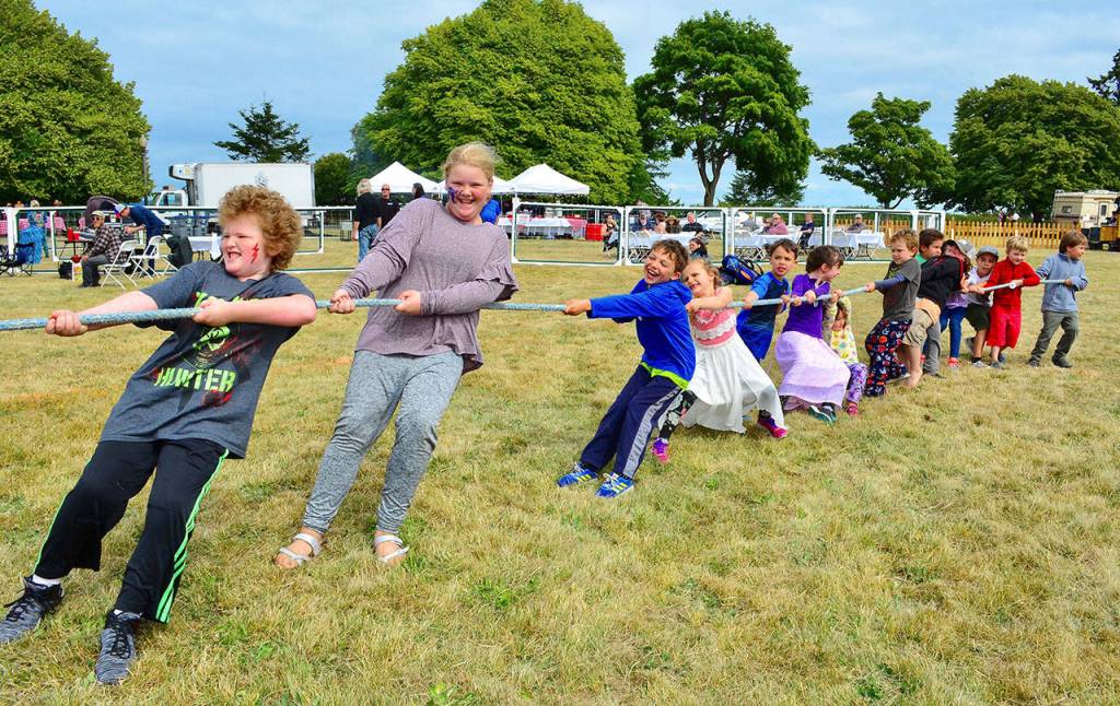 Kids take part in an impromptu tug of war during Port Townsends 4th annual Old School 4th of July celebration at Fort Worden. (James Cook/for Peninsula Daily News)