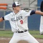 Keith Thorpe/Peninsula Daily News Relief pitcher Carson Ness throws in the fourth inning against Australia Red on Saturday evening at Port Angeles Civic Field.