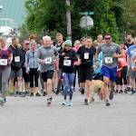 Levi Larson (40) far right of Forks was quick off the starting line Saturday during the Forks Fourth of July Fun Run in the 10K group. Larson finished first while Adison White of Utah placed first in the 5K. Approximately 75 runners and walkers participated in the annual race organized by Forks varsity basketball coach Rick Gooding to benefit the Forks High School basketball program. (Lonnie Archibald/for Peninsula Daily News)