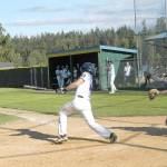 Pierre LaBossiere/Peninsula Daily News Wilder Jr.s Ty Bradow swings against Lynden Christian at Volunteer Field on Monday. Bradow was 2 for 3 in the game that Wilder Jr. won 10-3.