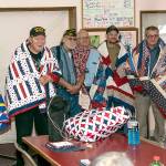 Brinnon quilting group presents eight blankets