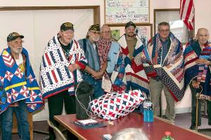 Brinnon quilting group presents eight blankets