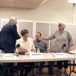The four candidates for the District 3 Chimacum School Board position congratulate each other at the end of a candidate forum put on by the Jefferson County League of Women Voters. (Zach Jablonski/Peninsula Daily News)