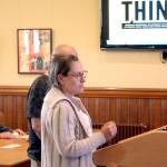 Nadia Quitslund, booking and sales manager for Seattle Theatre Group, addresses the Port Townsend City Council during a presentation Monday. Accompanied by Theatre Manager Mason Sherry, they spoke about potential impacts to city residents during the two-day Thing event Aug. 24-25 at Fort Worden. (Brian McLean/Peninsula Daily News)