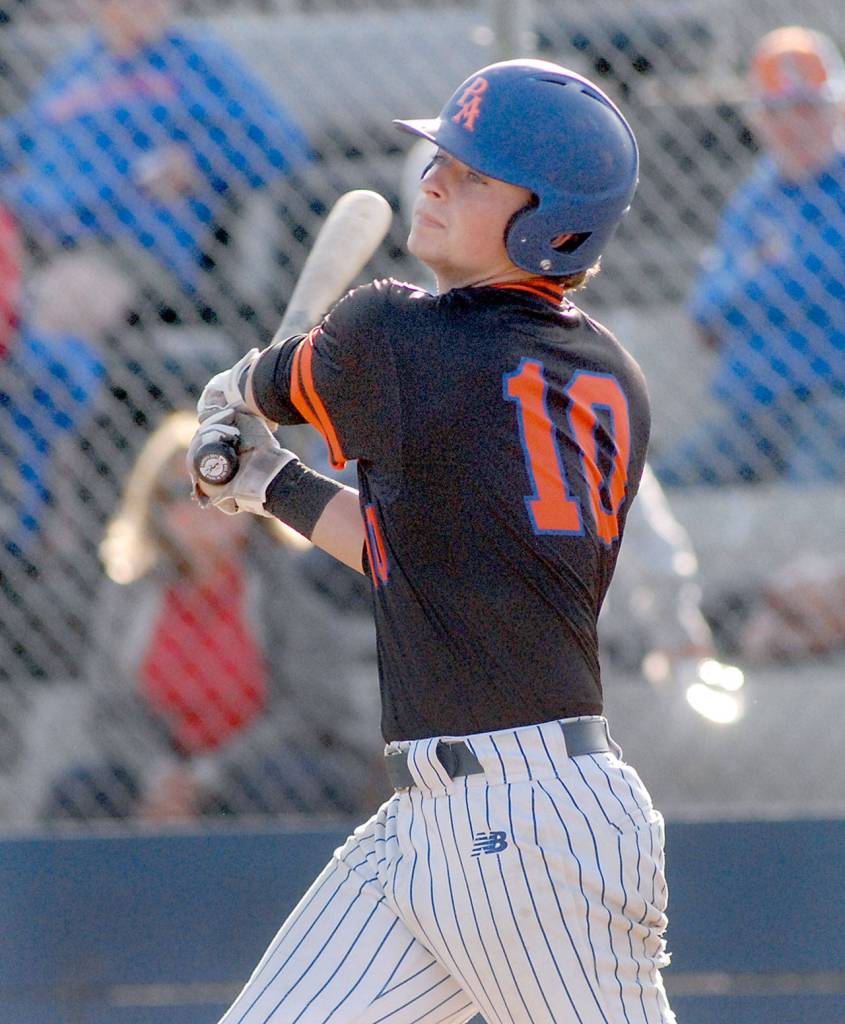 Keith Thorpe/Peninsula Daily News Lefties third baseman Justin Fugitt bats in the first inning against Kelowna on Friday at Port Angeles Civic Field.