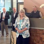 Karen McCormick is honored at a retirement ceremony at the First Federal branch in east Port Angeles. McCormick started as a teller at the branch in 1977 and later became First Federal CEO and First Federal Community Foundation executive director. (Rob Ollikainen/Peninsula Daily News)