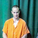 Joey Maillet, accused of driving heavy equipment into FREDS Guns in Sequim and stealing more than two dozen handguns, remained held in the Clallam County jail on a U.S. Marshal detainer after his state charges were dismissed Wednesday. (Jesse Major/Peninsula Daily News)