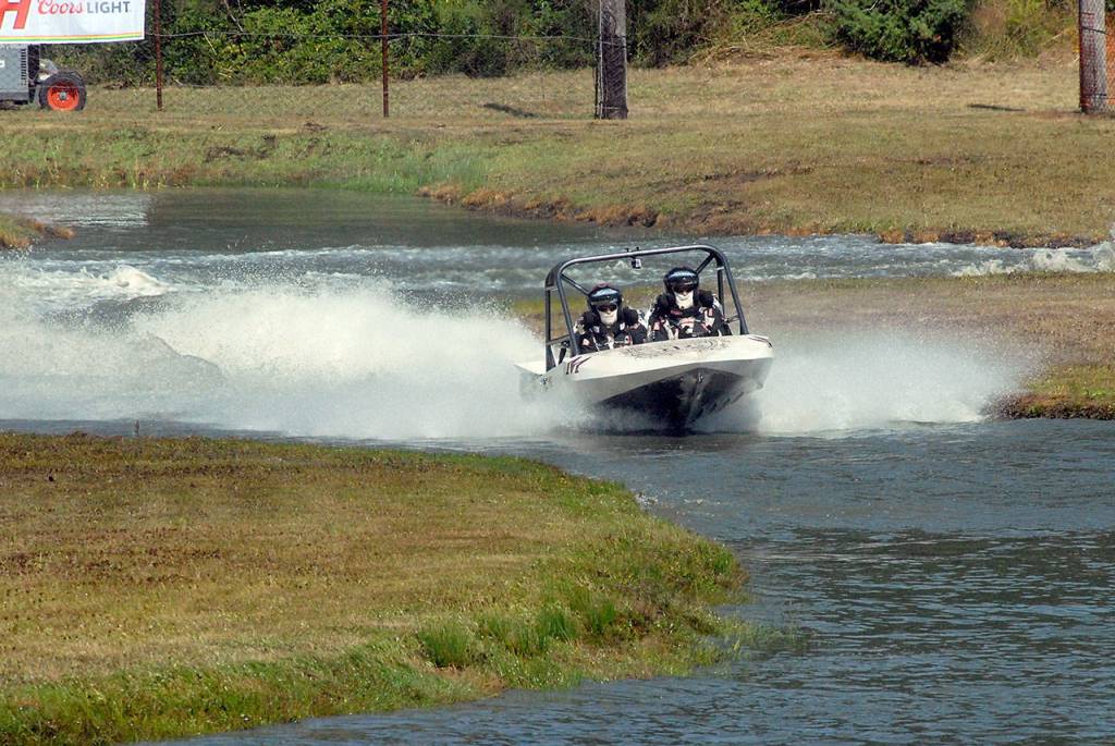 Keith Thorpe/Peninsula Daily News The Rum Runner racing team of driver Jerimy Brewer and navigator Pressley Lollar speeds through the course on Saturday.