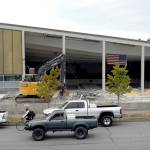 The former William Shore Memorial Pool stands partially gutted Thursday as crews work to demolish the structure, making way for a new pool on the site at Fifth and Lincoln streets in Port Angeles. (Keith Thorpe/Peninsula Daily News)