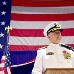 USCG Rear Adm. Anthony J. Vogt addresses guests at a change of command ceremony July 9 at U.S. Coast Guard Base Seattle