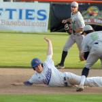 Keith Thorpe/Peninsula Daily News Lefties outfielder Rhyse De-Hyden makes an unsuccessful dive into second after being tagged out by Portland short stop Kyle Velazquiz as his teammate Austin Lively looks on during the second inning on Friday night in Port Angeles.