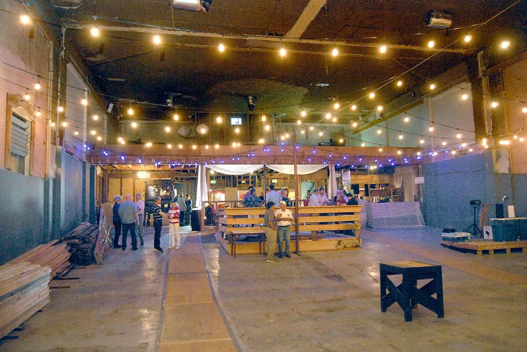 Members of the Port Angeles Business Association gather in the Lincoln Theater for a presentation about the status of the movie houses rennovation. (Keith Thorpe/Peninsula Daily News)