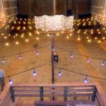 Suspended strings of lights provide atmosphere to the Lincoln Theater as it undergoes rennovation. (Keith Thorpe/Peninsula Daily News)
