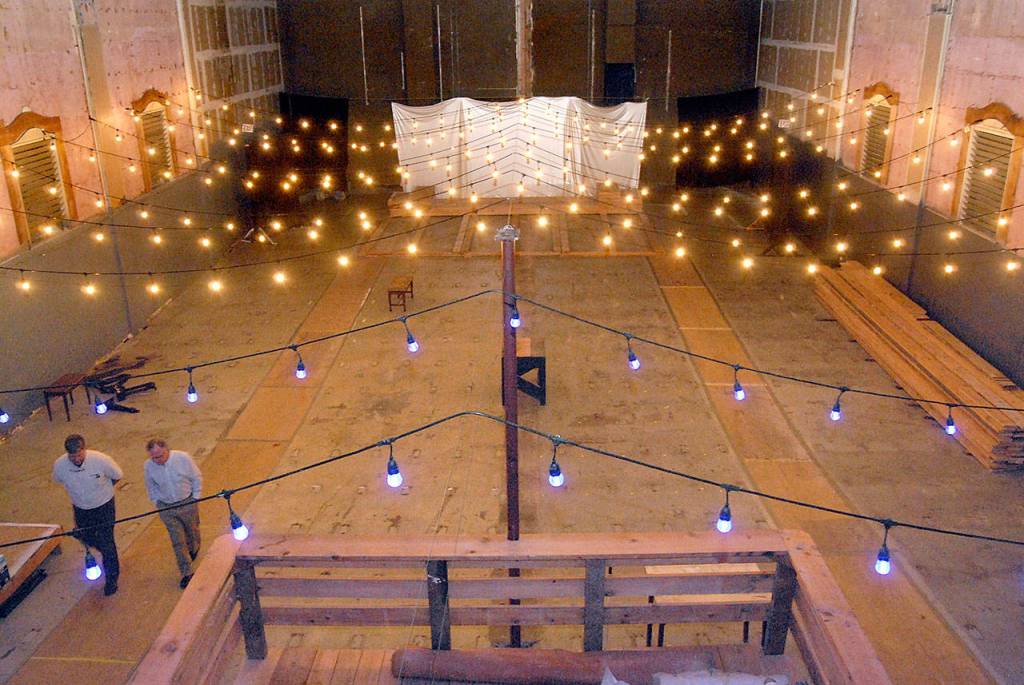 Suspended strings of lights provide atmosphere to the Lincoln Theater as it undergoes rennovation. (Keith Thorpe/Peninsula Daily News)