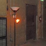 An illuminated ghost light stands near the backstage area at the Lincoln Theater. (Keith Thorpe/Peninsula Daily News)