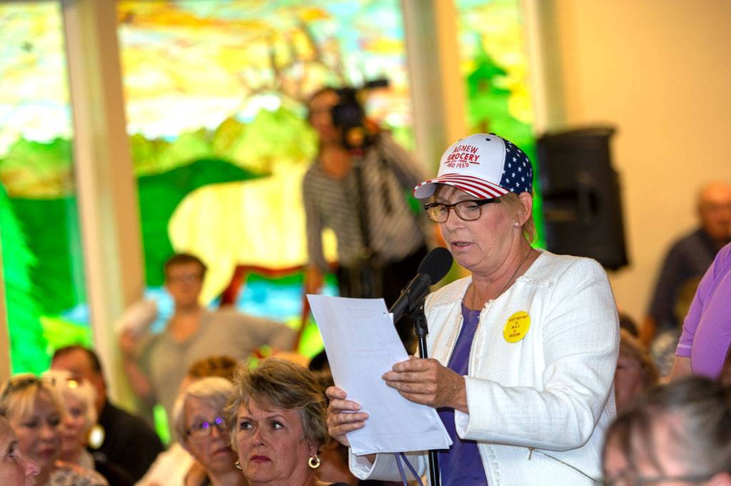 Jodi Wilke, a co-leader of Save our Sequim, speaks during the Jamestown SKlallam Tribes town hall meeting concerning its planned medicine-assisted treatment center in Sequim on Thursday. (Jesse Major/Peninsula Daily News)