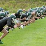 <strong>Keith Thorpe</strong>/Peninsula Daily News                                The Port Angeles football team runs conditioning drills during a preseason practice Friday.