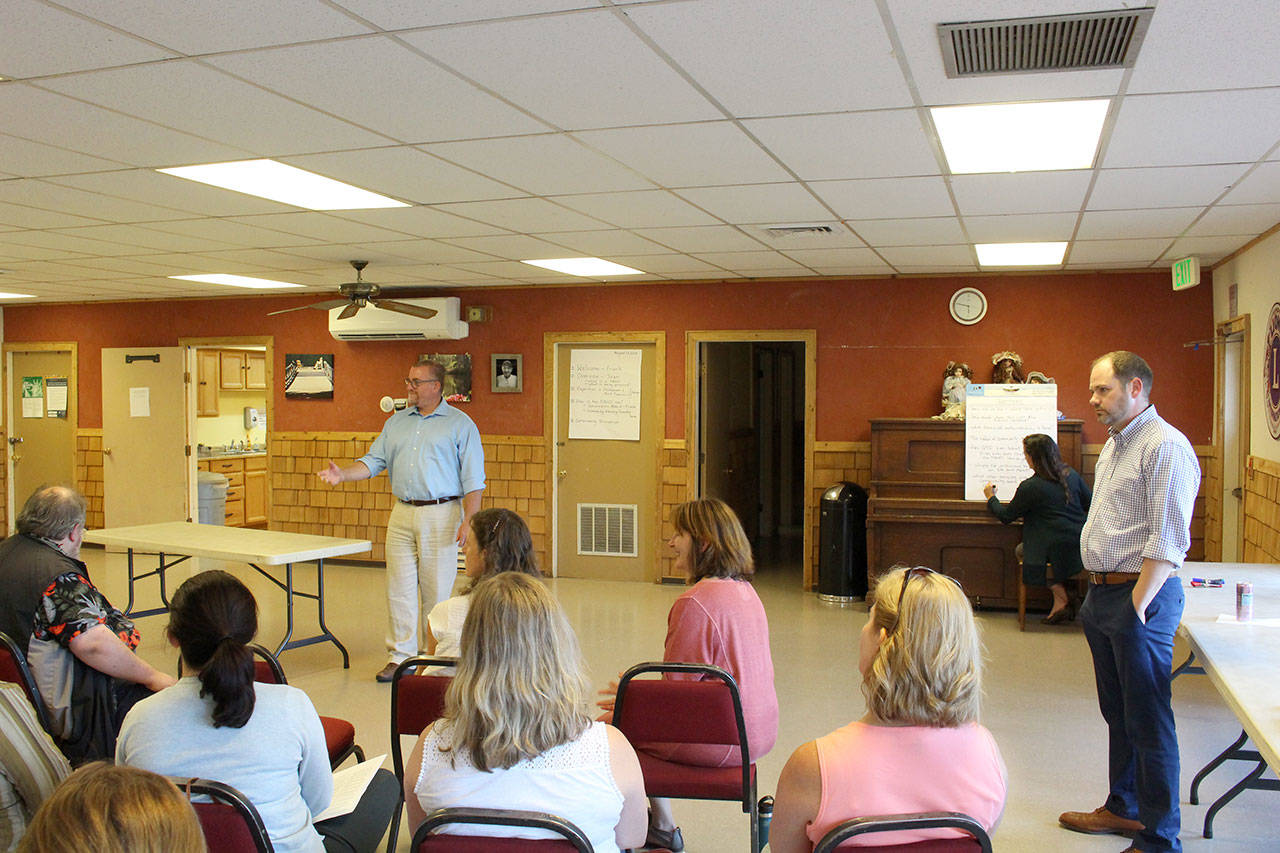 Quilcene Superintendent Frank Redmon answers questions about a proposed school-based health center with Principal Sean Moss and the nurse practitioners from the Port Townsend and Chimacum districts. (Zach Jablonski/Peninsula Daily News)