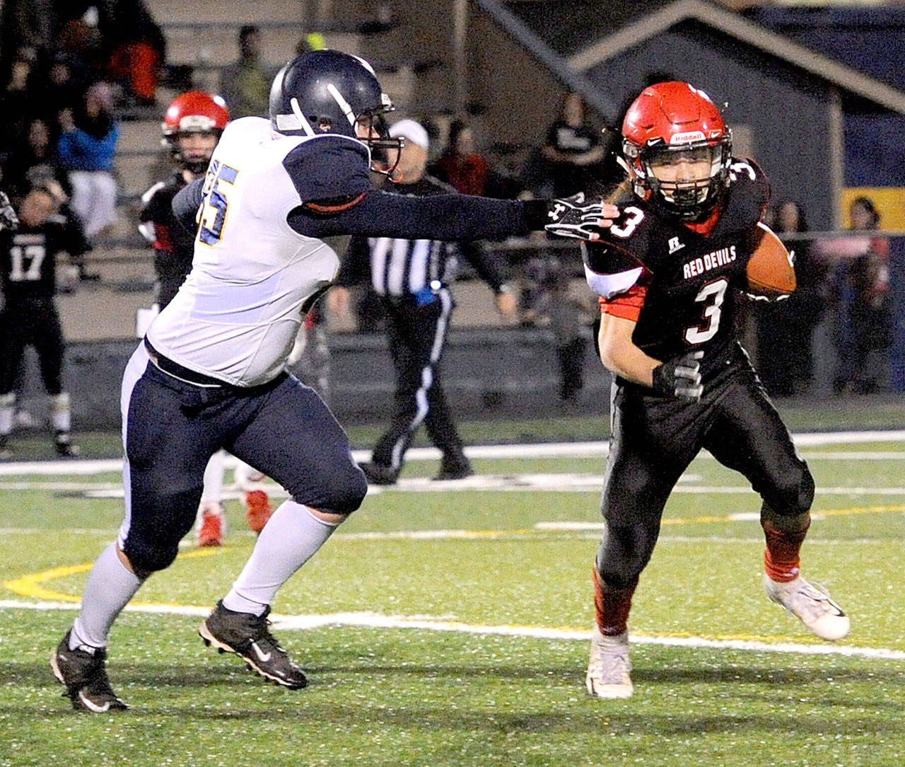 Neah Bays Toby Croy runs against Tacoma Baptist in the 2018 1B district playoffs. Croy is expected to get a lot of carries and catches for the Red Devils this season. (Lonnie Archibald/for Peninsula Daily News)