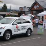 The Pet Posse veterinary transport vehicle parked in front of the Barks & Brews fundraiser event put on at the Peninsula Taproom on Aug. 10 to support the organization. Barks & Brews attracted more than 70 attendees and raised more than $5,000. Conor Dowley/Olympic Peninsula News Group
