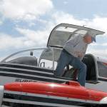 Bil Shepherd of Diamond Point steps out of his 1955 Super Aero 45 after landing on Saturday at Sequim Valley Airport. (Keith Thorpe/Peninsula Daily News)