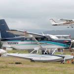 A Cessna 150 takes off from Sequim Valley Airport behind a float plane during Air Affaire at Sequim Valley Aiport on Saturday. (Keith Thorpe/Peninsula Daily News)