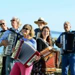 Among the instigators of this weekends Deep Squeeze festival are, from left, George Radebaugh, Paul Rogers, Luann Rogers, Michael Townsend, Vickie Townsend and Joe Schipani. (Diane Urbani de la Paz/for Peninsula Daily News)