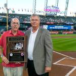Port Angeles High School and Peninsula college alum Bernie Fryer, right, who played in the NBA and officiated in the league for decades, was inducted into the Washington Sports Hall of Fame by executive director Marc Blau before a recent Seattle Mariners game. Ben VanHouten/Seattle Mariners