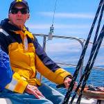 Bob McClinton captains the America in the 2018 Reach and Row for Hospice event. Organizers of the 2019 event have dedicated this years sailing race to the late McClinton, who raised more than $100,000 for Volunteer Hospice of Clallam County through the annual fundraiser.