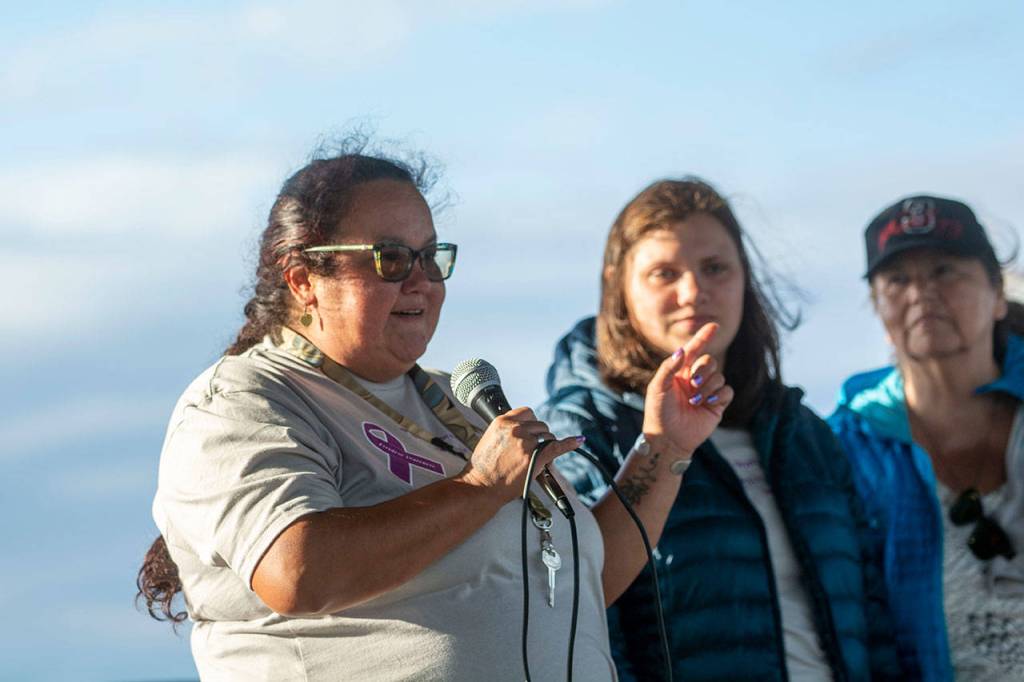 Jessica Elofson talks about her recovery during the walk. (Jesse Major/Peninsula Daily News)