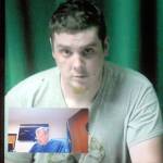 Jason Hutt appears by video link during his first appearance in Clallam County Superior Court on Tuesday. Judge Brent Basden is shown in the video inset. (Keith Thorpe/Peninsula Daily News)