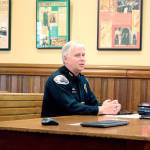 Port Townsend Police Chief Michael Evans breaks down the five-year costs of portable body cameras before City Council members. The 20 eye-level units would replace the vehicle-mounted systems the officers use now. (Brian McLean/Peninsula Daily News)