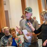 Larry Morrell of the Sound Defense Alliance questions U.S. Rep. Derek Kilmers position on FA-18 Growler jets from Naval Air Station Whidbey Island during a town hall at the Rainforest Arts Center in Forks on Wednesday evening. (Jesse Major/Peninsula Daily News)