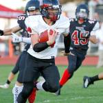 Port Townsends Dylan Tracer rumbled for 182 rushing yards and scored four touchdowns in the Redhawks 49-16 win over Coupeville on Friday.                                Lisa Jensen/photo