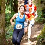 Ursula Hardy, foreground, of Bainbridge, leads Steve Hardy, background, also of Bainbridge run in the GOAT half-marathon on Saturday. Steve Hardy won his 50-59 age division, while Ursula Hardy finished fifth in the womens 18-29 category. They ended up finishing a second apart. (Peninsula Adventure Sports)