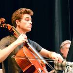 Port Angeles Symphony cellist Karson Nicpon, 17, shown here rehearsing, will be among the performers at Fridays Concert & Cuisine. The fundraiser moves to The Cedars at Dungeness this year. (Diane Urbani de la Paz/for Peninsula Daily News)