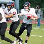Mark Krulish/Kitsap Daily News Noa Apker-Montoya runs with the ball during a game against Kingston that was eventually canceled by lightning strikes. Port Townsend trailed Kingston 20-0 but was at the Bucs 1-yard line when the game was halted in the middle of the second quarter.                                Mark Krulish/Kitsap Daily News Noa Apker-Montoya runs with the ball during a game against Kingston that was eventually canceled by lightning strikes. Port Townsend trailed Kingston 20-0 but was at the Bucs 1-yard line when the game was halted in the middle of the second quarter.