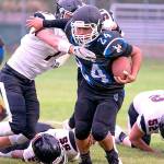 PREP FOOTBALL: Forks switches sidelines