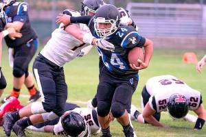 PREP FOOTBALL: Forks switches sidelines