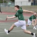 Dave Logan/for Peninsula Daily News The Port Angeles boys tennis doubles duo of Milo Whitman, front, and Dru Clark competed in a rain-shortened match against Klahowya on Monday.