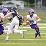 Michael Dashiell/Olympic Peninsula News Group Sequims Garrett Hoesel runs with the football during a win over Forks last week.